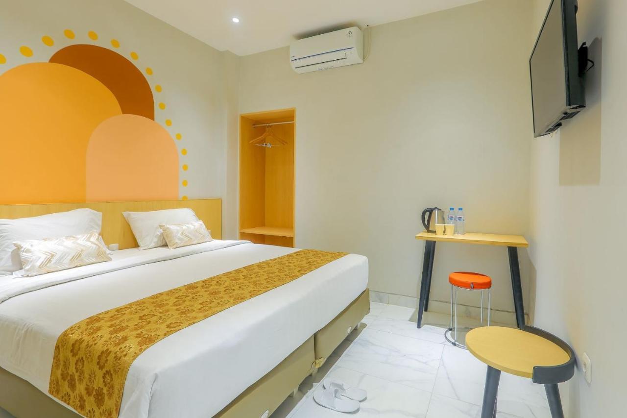 Genio Inn - MANTOS Manado Exterior foto