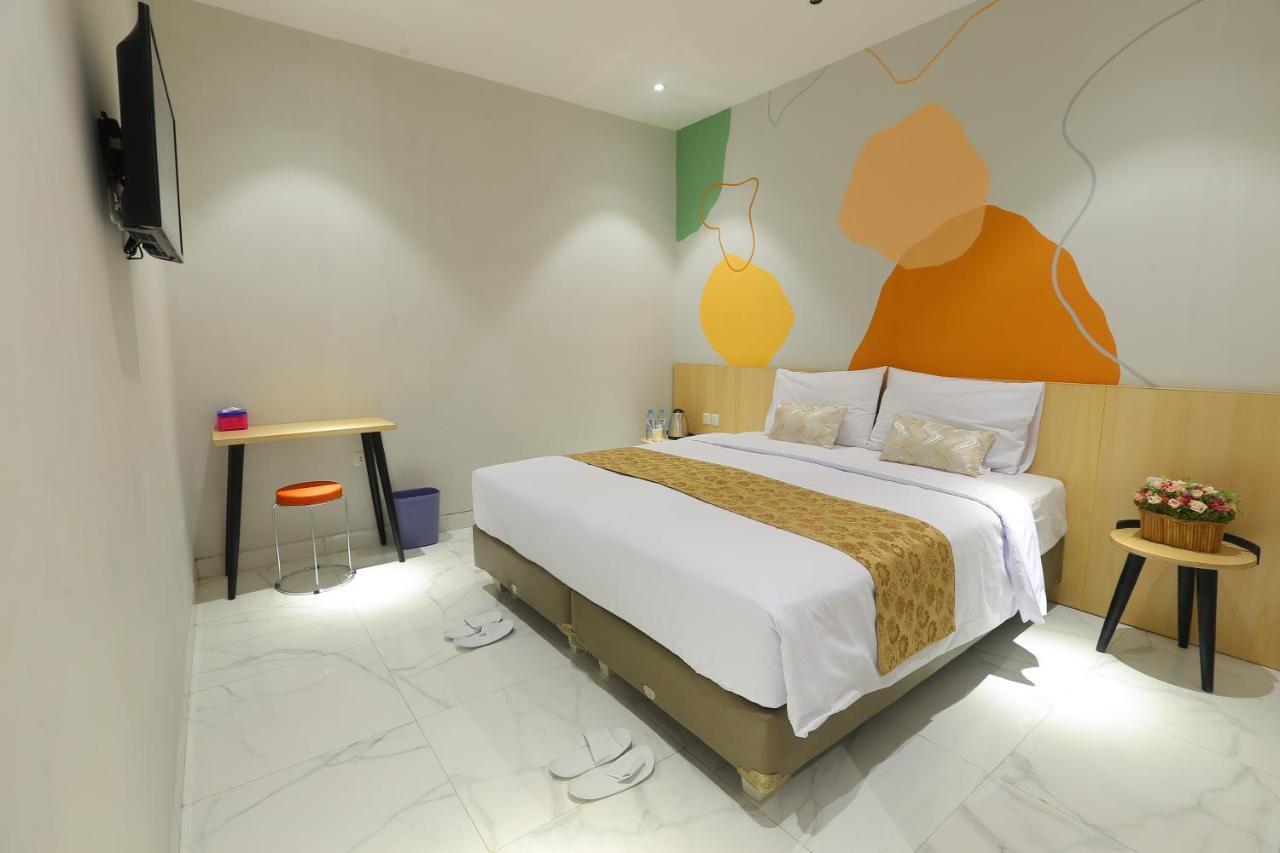 Genio Inn - MANTOS Manado Exterior foto