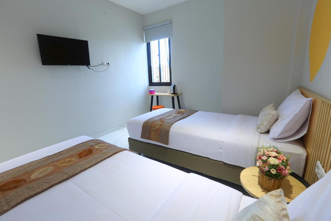 Genio Inn - MANTOS Manado Exterior foto